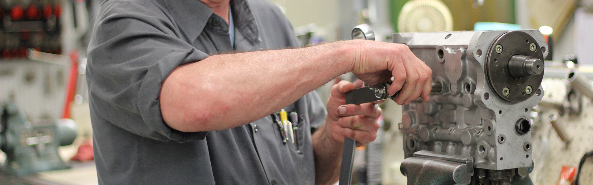 Technician working on diesel engine